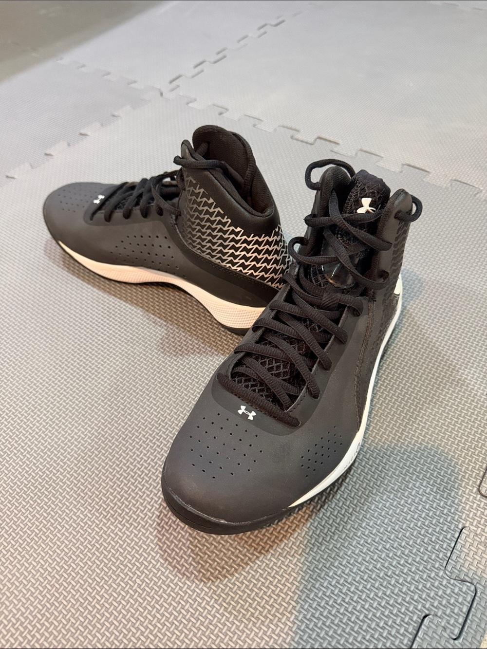 Under Armour Clutchfit Black and White Mid-Top Basketball Sneakers